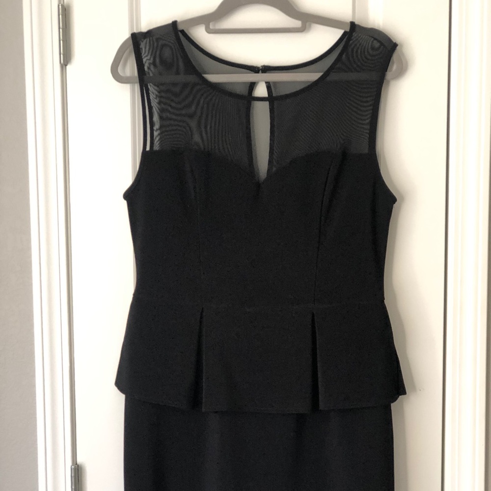 Fitted, Mesh tip black Peplum mini dress